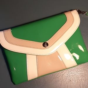 Cute green clutch with removable strap.